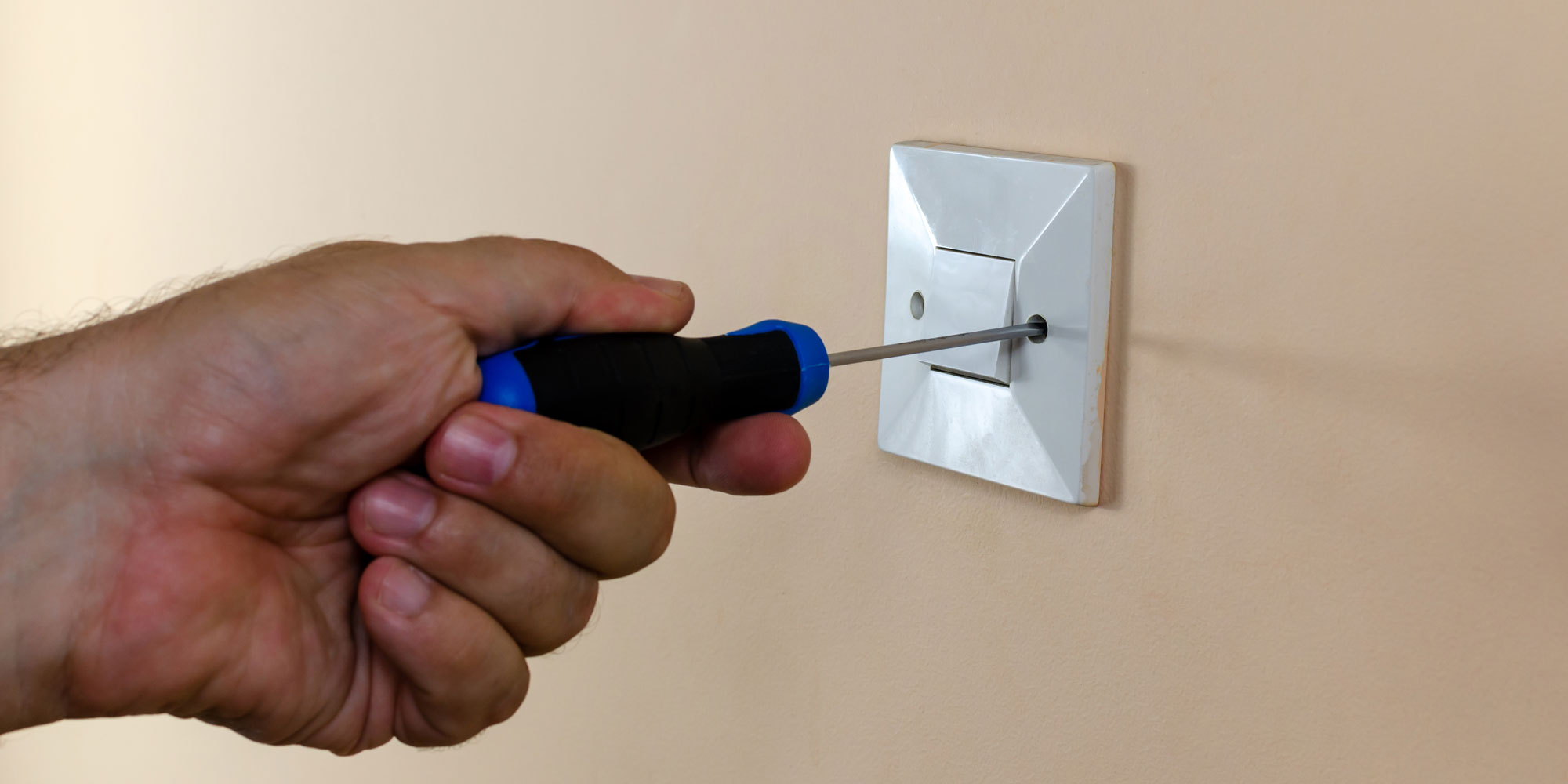 Unscrewing light switch