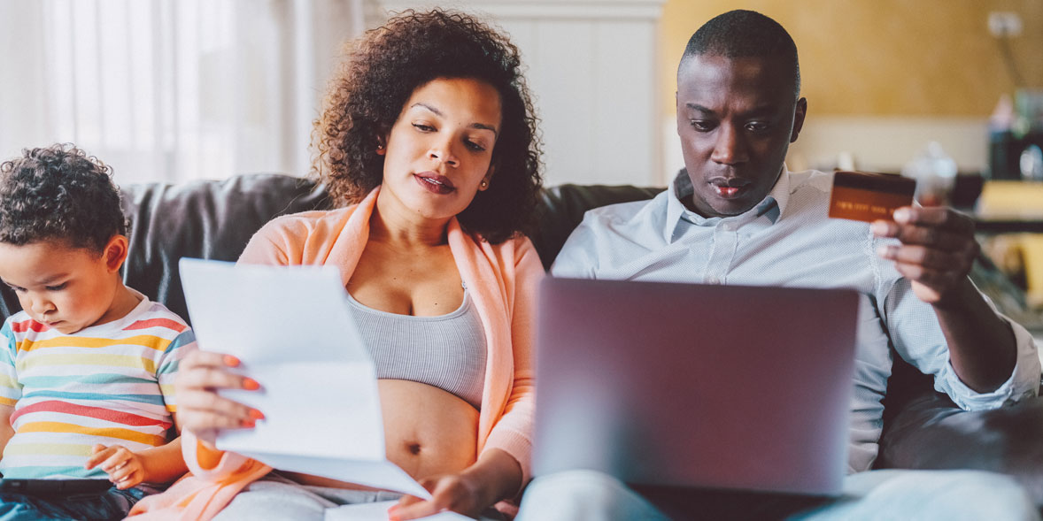 Family reviewing their credit card bill