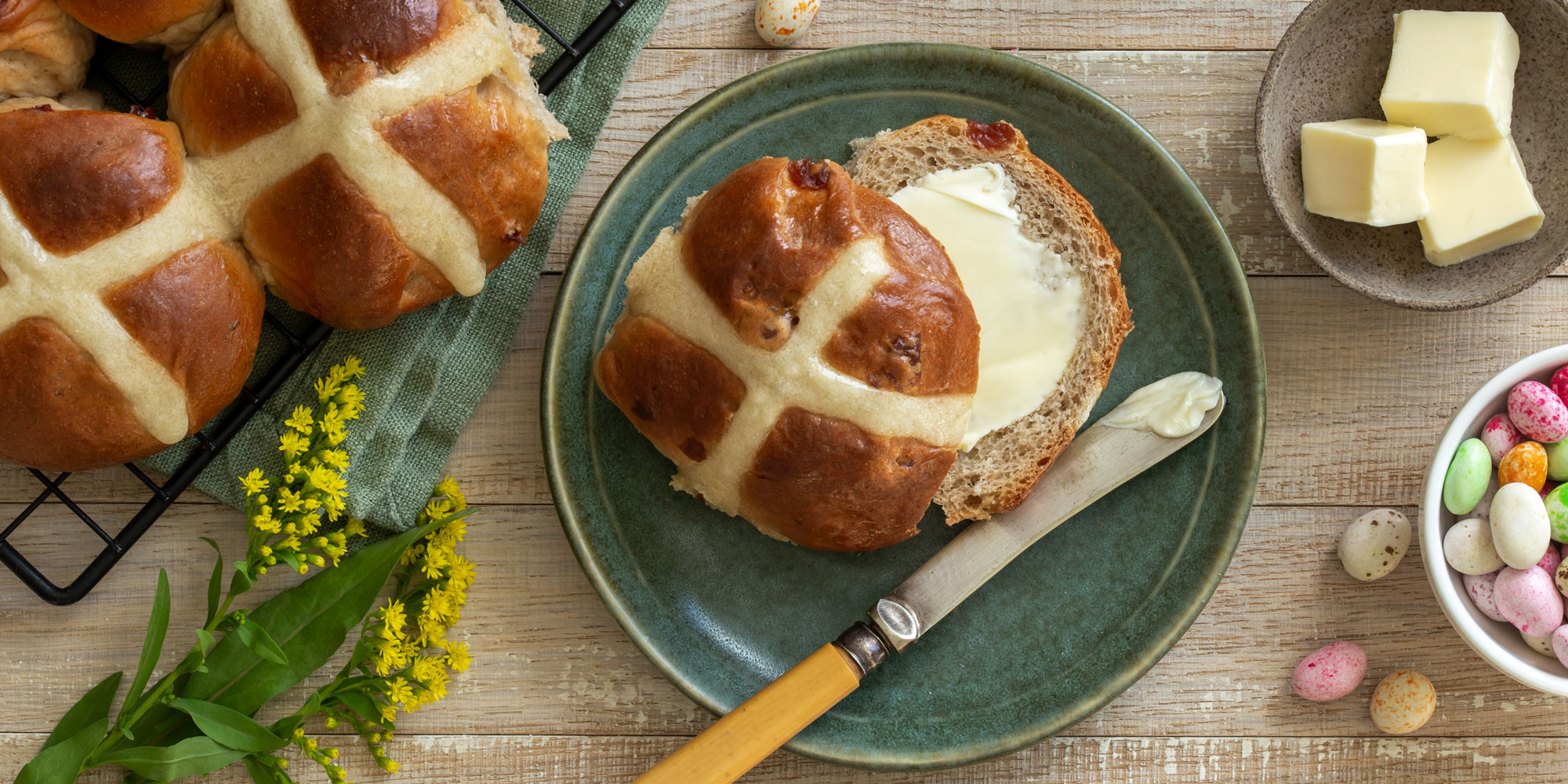Hot cross bun with butter