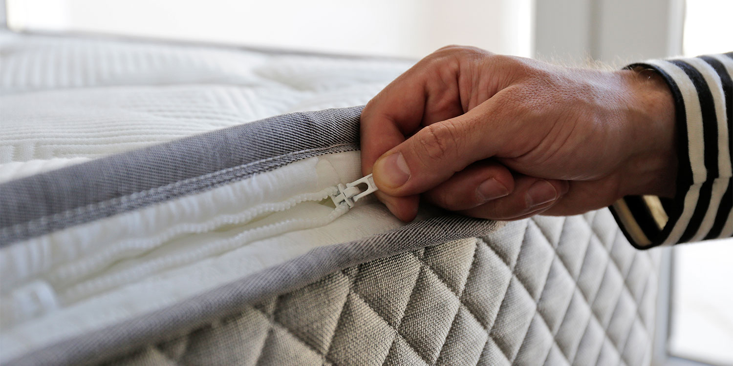 Zipping off a mattress cover