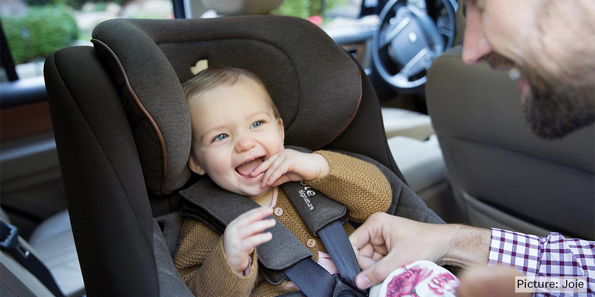 Child in a swivel car seat
