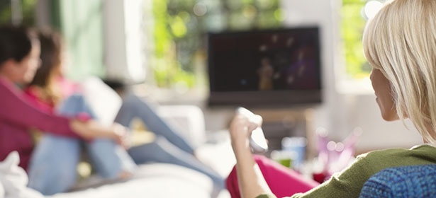Group of friends watching TV